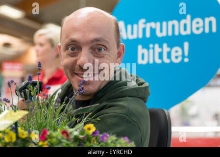 Bernhard Hoecker behind the counter during 'Woche des Aufrundens' by children's charity Deutschland rundet auf at toom Baumarkt  Featuring: Bernhard Hoecker Where: Berlin, Germany When: 02 Jun 2015 C Stock Photo