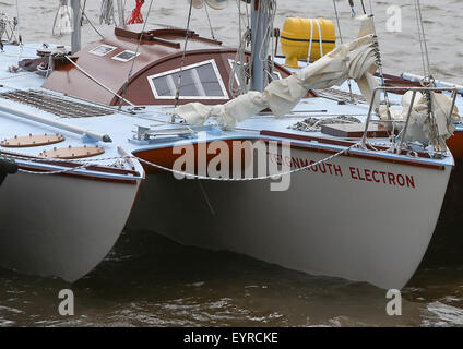 A replica of the boat used by Donald Crowhurst to compete in the 1968 Golden Globe Race moored in Teignmouth harbour to be used in the film being made about his life  Featuring: Teignmouth Electron Where: Devon, United Kingdom When: 02 Jun 2015 C Stock Photo