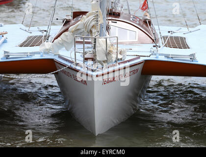 A replica of the boat used by Donald Crowhurst to compete in the 1968 Golden Globe Race moored in Teignmouth harbour to be used in the film being made about his life  Featuring: Teignmouth Electron Where: Devon, United Kingdom When: 02 Jun 2015 C Stock Photo