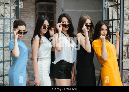 Five young beautiful girls in the city Stock Photo