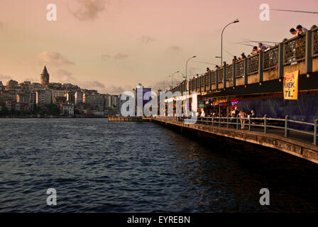 Some people fishing in the Galata Bridge, Istanbul. Stock Photo