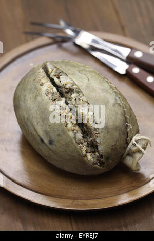 homemade haggis, scotland food isolated on wooden background Stock Photo