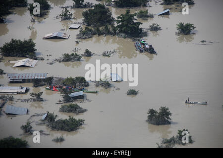 Kalay. 3rd Aug, 2015. Photo taken on Aug. 3, 2015 shows an aerial view of flooded buildings in Kalay township of Sagaing Region, Myanmar. Heavy monsoon rains have left at least 47 people dead and affected more than 210,000 others in 12 out of Myanmar's 14 states and regions since June, the Ministry of Social Welfare, Relief and Resettlement said on Monday. Credit:  Ko Thaung/Xinhua/Alamy Live News Stock Photo