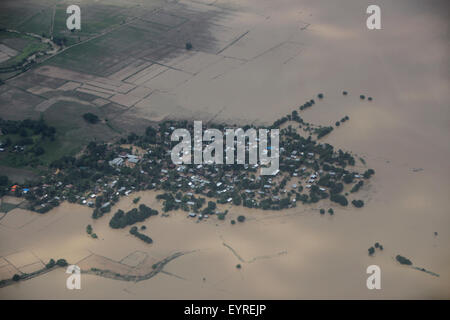 Kalay. 3rd Aug, 2015. Photo taken on Aug. 3, 2015 shows an aerial view of flooded buildings in Kalay township of Sagaing Region, Myanmar. Heavy monsoon rains have left at least 47 people dead and affected more than 210,000 others in 12 out of Myanmar's 14 states and regions since June, the Ministry of Social Welfare, Relief and Resettlement said on Monday. Credit:  Ko Thaung/Xinhua/Alamy Live News Stock Photo