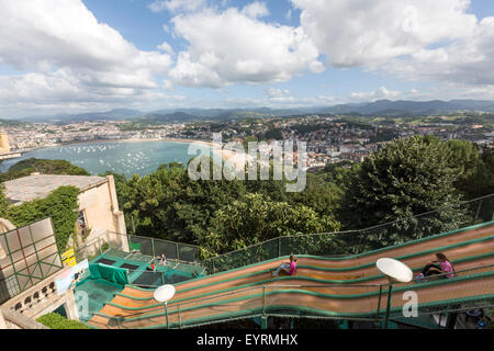 Toboggan in the amusement park on top of Monte Igueldo and the spectacular view of San Sebastian. Stock Photo