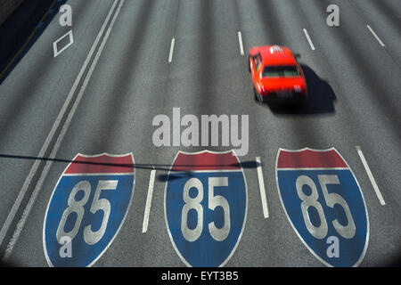 PAINTED SHIELDS ON I-85 / I-75  INTERSTATE HIGHWAY CONNECTOR ATLANTA GEORGIA USA Stock Photo