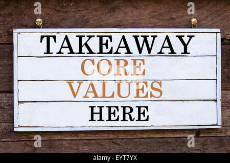 Takeaway Core Values Here Inspirational message written on vintage wooden board. Motivation concept image Stock Photo