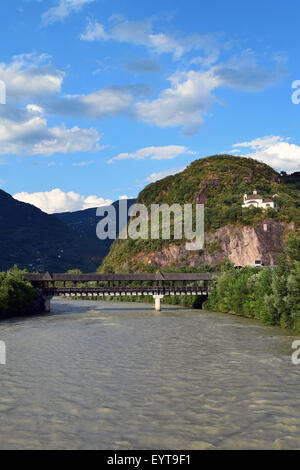 Church on the hill above a wood bridge in Bolzano-Bozen Stock Photo