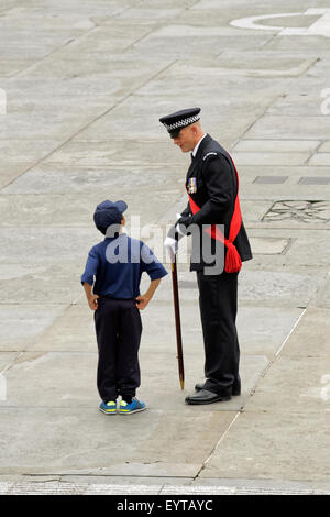 London, UK. 03rd Aug, 2015. A Metropolitan Police Drill Instructor prepares a Volunteer Cadet to lead the first ever parade to thank Volunteer Cadets by the Metropolitan Police on Trafalgar Square, 3rd August 2015. Credit:  Paul Grove/Alamy Live News Stock Photo