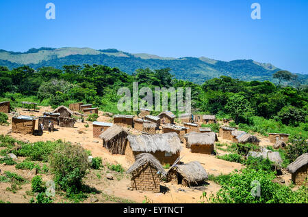 Villages of Angola in the countryside, with mud houses and thatched roofs Stock Photo