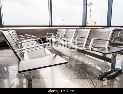 New benches at the airport Stock Photo