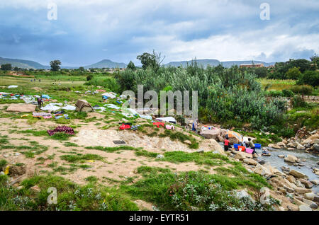 Laundry at the river in Angola (Lubango suburbs) Stock Photo