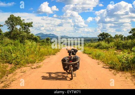Adventure and bicycle touring on the dirt roads of Angola Stock Photo