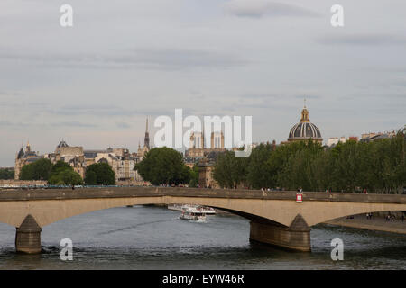 Pont du Carrousel with Notre-Dame and the Cupola of the Institut de France in the background. Stock Photo
