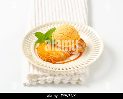 Spritz cookie with scoop of ice cream Stock Photo