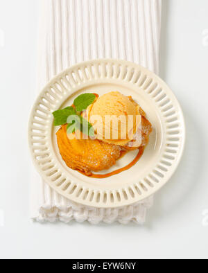 Spritz cookie with scoop of ice cream Stock Photo