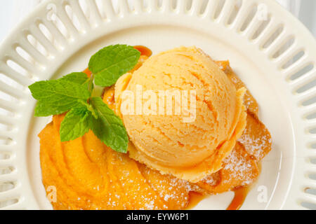Spritz cookie with scoop of ice cream Stock Photo