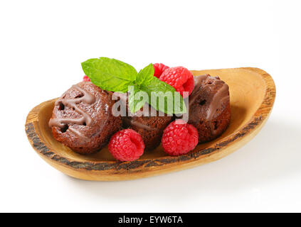 Mini chocolate cakes with raspberry filling Stock Photo