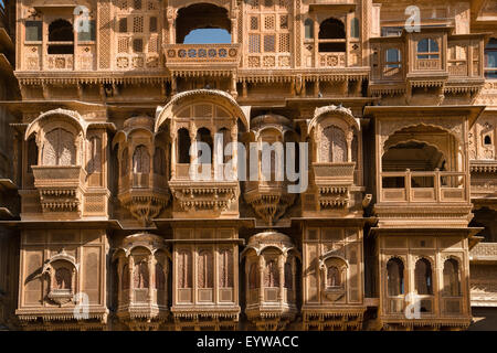 Windows and balconies, delicately decorated facade of Patwon Ki Haveli or Patwa ki Haveli, Jaisalmer, Rajasthan, India Stock Photo