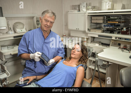 Dentist Office-Digital tablet with a patients x-rays Stock Photo
