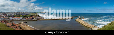 Panoramic view of Whitby harbour and piers shot from St Mary's church on the East cliff. Stock Photo