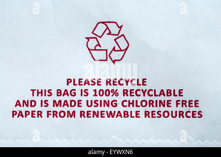 Please recycle - this bag is 100% recyclable and is made using chlorine free paper from renewable resources - disposal recycling recycle logo symbol Stock Photo