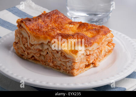 Fresh lasagne on a white plate Stock Photo