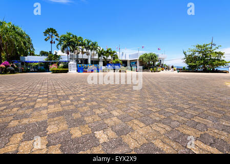 PHUKET, THAILAND - APRIL 29 2015: Front exterior building of Phuket Aquarium and tourists who come to visit, is part of the inte Stock Photo