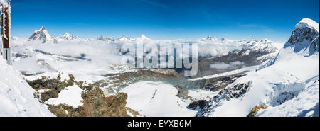 Panoramic view from the viewing platform at the top of the Matterhorn Glacier Paradise with the Matterhorn and Breithorn. Stock Photo