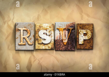 The word "RSVP" written in rusty metal letterpress type on a crumbled aged paper background. Stock Photo