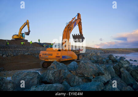 Constructing Sea Defenses, Bunmahon Strand, Copper Coast,  Co Waterford, Ireland Stock Photo