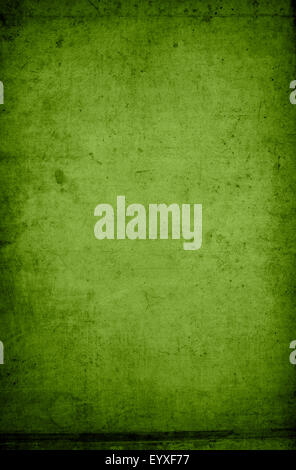 Old rough green colored concrete wall background Stock Photo