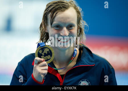 Kazan, Russia. 4th Aug, 2015. Katie Ledecky of the United States reacts at the awarding ceremony after the women's 1500m freestyle swimming final at FINA World Championships in Kazan, Russia, Aug. 4, 2015. Katie Ledecky claimed the title and broke the world record in a time of 15 minutes 25 seconds 48. Credit:  Zhang Fan/Xinhua/Alamy Live News Stock Photo