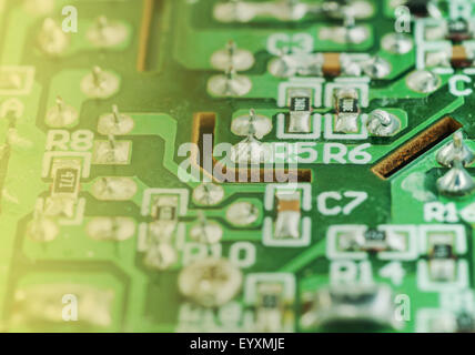 Closeup of an electronic printed broken circuit board with many electrical Stock Photo