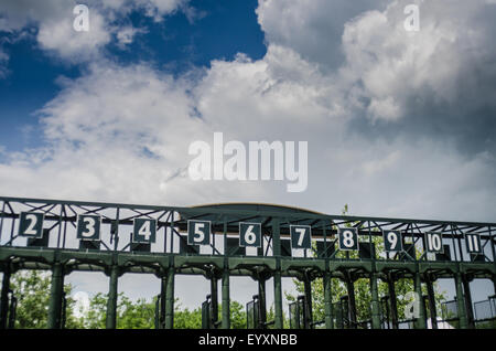 The gate for horse races empty on a summer afternoon Stock Photo
