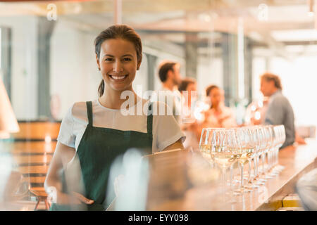 Portrait smiling winery tasting room worker Stock Photo