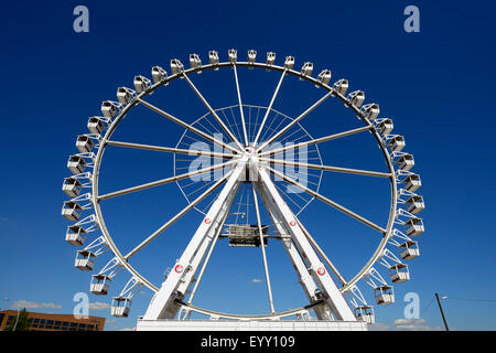 Ferris wheel at Strandkai in the harbor city, Hamburg, Germany Stock Photo