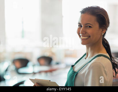 Portrait smiling winery tasting room worker Stock Photo