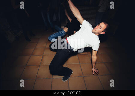 Friends dancing in nightclub Stock Photo