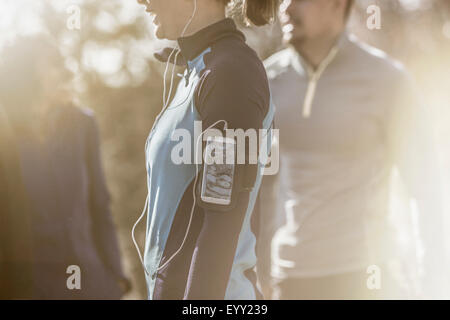 Close up of runner wearing mp3 player Stock Photo