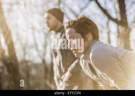 Close up of runner resting outdoors Stock Photo