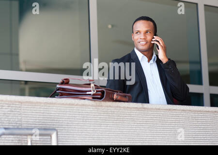 Black businessman talking on cell phone Stock Photo