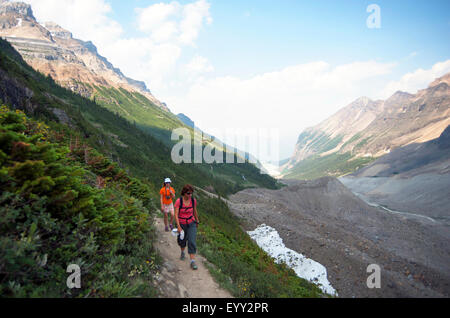 Caucasian mother and daughter hiking on Six Glaciers Trail, Banff, Alberta, Canada Stock Photo