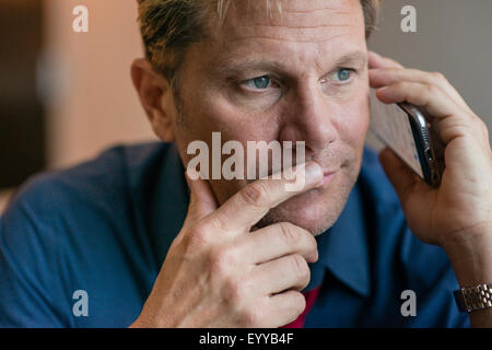 Caucasian businessman talking on cell phone Stock Photo