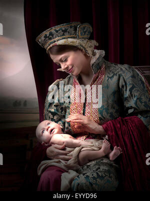 Caucasian medieval mother holding baby son Stock Photo