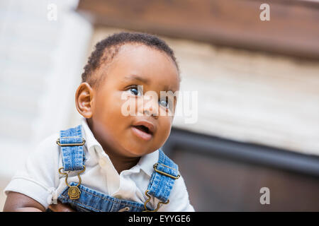 Close up of Black baby boy in living room Stock Photo