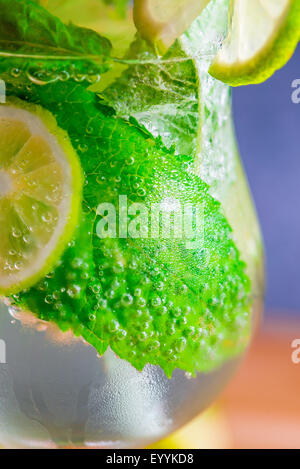 fizzy cold mojito cocktail in a glass closeup Stock Photo