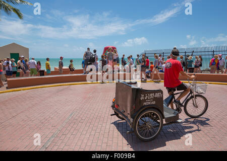 TOURISTS LINE UP IN QUEUE TO POSE BY  SOUTHERNMOST POINT IN CONTINENTAL UNITED STATES MONUMENT KEY WEST FLORIDA USA Stock Photo