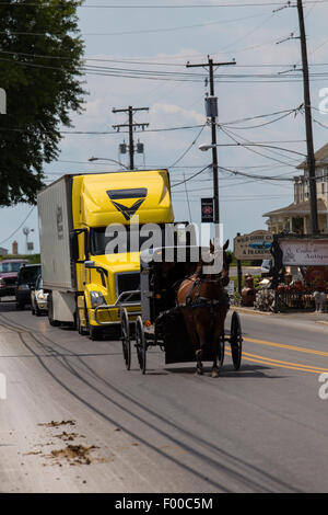 Amish buggies share the road with trucks in Lancaster County, PA. Stock Photo