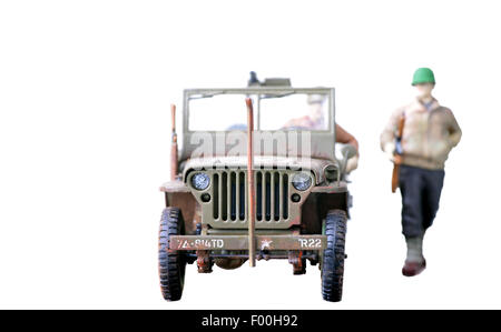 Soldiers and Jeep plastic models isolated on a white background Stock Photo